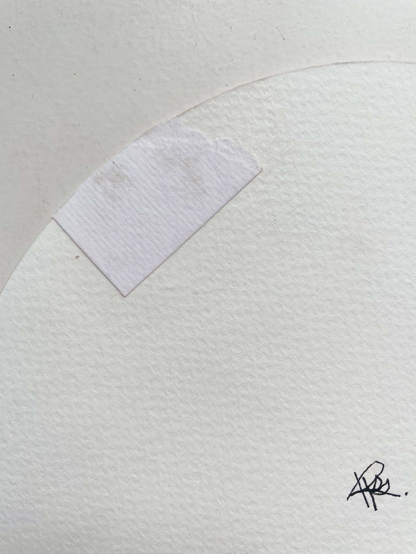 Closeup of paper joint to repair a very superficial tear on Letter K Monogram.